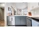 Modern kitchen area featuring stainless steel appliances, and plenty of natural light at 7454 Harbour Isle # 158, Indianapolis, IN 46240