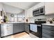 Well-equipped kitchen with modern appliances and plenty of counter space at 7454 Harbour Isle # 158, Indianapolis, IN 46240