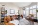 Inviting living room with ample seating, natural light, and stylish decor at 7454 Harbour Isle # 158, Indianapolis, IN 46240