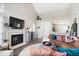 Comfortable living space with a fireplace, modern finishes, and open layout at 7454 Harbour Isle # 158, Indianapolis, IN 46240