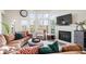 Cozy living room with fireplace and large windows, perfect for relaxation at 7454 Harbour Isle # 158, Indianapolis, IN 46240