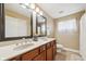 Bathroom with double sink vanity, large mirrors, and ample counter space at 7974 N 500 W, McCordsville, IN 46055