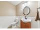 Bathroom with vanity, mirror, white paneling, and a toilet at 7974 N 500 W, McCordsville, IN 46055