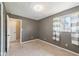 Bedroom with tan walls, neutral carpet and natural lighting at 7974 N 500 W, McCordsville, IN 46055