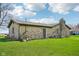 Stone house featuring a well-kept lawn and a side entrance at 7974 N 500 W, McCordsville, IN 46055