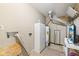 Utility room with a water heater, storage, and wall-mounted TV at 7974 N 500 W, McCordsville, IN 46055