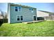 The backyard is spacious and the home offers a wood deck at 8051 Retreat Ln, Indianapolis, IN 46259