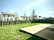 Fenced backyard with wooden deck ideal for outdoor relaxation and gatherings at 8051 Retreat Ln, Indianapolis, IN 46259