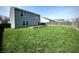 Spacious backyard with a wooden deck, perfect for outdoor entertaining and relaxation at 8051 Retreat Ln, Indianapolis, IN 46259