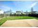 The backyard is spacious with a wood deck and a wood privacy fence at 8051 Retreat Ln, Indianapolis, IN 46259