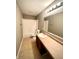 This bathroom offers a neutral paint, tile floors and a shower-tub combo at 8051 Retreat Ln, Indianapolis, IN 46259