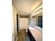 Functional bathroom with vanity, mirror, and tub/shower combo, offering essential amenities at 8051 Retreat Ln, Indianapolis, IN 46259