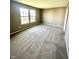 Bedroom featuring neutral walls, plush carpet, and natural light, creating a peaceful retreat at 8051 Retreat Ln, Indianapolis, IN 46259