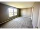 Bright bedroom with neutral walls, carpet, and plenty of natural light, providing a cozy atmosphere at 8051 Retreat Ln, Indianapolis, IN 46259