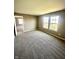Bedroom features neutral colors, plush carpeting and natural light creating a warm and inviting space at 8051 Retreat Ln, Indianapolis, IN 46259