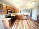 Well-equipped kitchen boasts stainless steel appliances, ample cabinetry, and durable countertops at 8051 Retreat Ln, Indianapolis, IN 46259