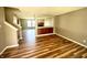 Spacious living room featuring beautiful wood floors, an open concept design, and a cozy fireplace at 8051 Retreat Ln, Indianapolis, IN 46259