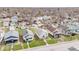 Neighborhood view of cozy homes with well-kept lawns and mature trees creating a peaceful setting at 831 Wallace Ave, Indianapolis, IN 46201