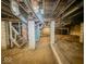 Unfinished basement with exposed pipes and cinder block walls at 831 Wallace Ave, Indianapolis, IN 46201