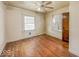 Bedroom featuring hardwood floors and natural light at 831 Wallace Ave, Indianapolis, IN 46201