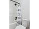 Modern bathroom with a sleek, black shower head and eye-catching black and white patterned shower curtain at 8660 Benjamin Ln, Avon, IN 46123