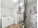 Utility room features new energy efficient furnace and modern washer and dryer units at 8660 Benjamin Ln, Avon, IN 46123