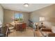 Well-lit bedroom with furniture, a window with shutters, and decorative items at 8939 Spider Bay Ct, Indianapolis, IN 46236
