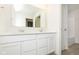 Bathroom featuring a double sink vanity with modern finishes, and a shower at 9738 Behner Dr, Fishers, IN 46250