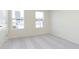 Bedroom featuring plush carpeting and a large window offering neighborhood views at 9738 Behner Dr, Fishers, IN 46250