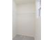 Bright walk-in closet with wire shelving and neutral carpeting at 9738 Behner Dr, Fishers, IN 46250