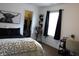 Stylish bedroom showcasing a comfortable bed, ample natural light, and modern decor creating a cozy and inviting atmosphere at 981 Redwood Dr, Franklin, IN 46131