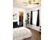 Cozy bedroom features neutral walls, a ceiling fan, and a walk-in closet at 981 Redwood Dr, Franklin, IN 46131