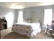 Bright bedroom featuring neutral walls, dual windows, and a comfortable quilt at 981 Redwood Dr, Franklin, IN 46131