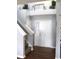 Bright foyer featuring hardwood floors, staircase, and white doors at 981 Redwood Dr, Franklin, IN 46131