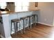 Kitchen bar with stylish seating, great for casual dining and entertaining at 981 Redwood Dr, Franklin, IN 46131