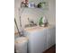 Convenient laundry room featuring a modern washer and dryer, plus storage at 981 Redwood Dr, Franklin, IN 46131