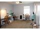 Versatile space with carpeted floors is perfect for hobbies or a home office at 981 Redwood Dr, Franklin, IN 46131