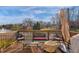 Back deck features comfortable seating and a beautiful view of the pond and fountain at 9877 Wading Crane Ave, Fishers, IN 46055