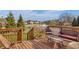 Outdoor deck overlooking a pond and fountain, perfect for relaxing and enjoying the scenery at 9877 Wading Crane Ave, Fishers, IN 46055
