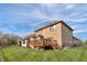 Spacious backyard with a wooden deck perfect for entertaining at 9877 Wading Crane Ave, Fishers, IN 46055