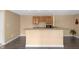 Basement bar area with granite countertop and wine rack at 9877 Wading Crane Ave, Fishers, IN 46055