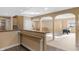 Finished basement with a wet bar, stairs to the first floor and an open seating area at 9877 Wading Crane Ave, Fishers, IN 46055