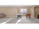 Spacious basement area featuring carpet flooring, games and a bright window at 9877 Wading Crane Ave, Fishers, IN 46055
