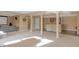 Finished basement featuring a wet bar, neutral carpeting and arches at 9877 Wading Crane Ave, Fishers, IN 46055