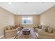 Finished basement features a seating area, large window and traditional rug at 9877 Wading Crane Ave, Fishers, IN 46055