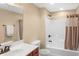 Bathroom with white vanity, toilet, and tub/shower combination at 9877 Wading Crane Ave, Fishers, IN 46055