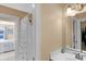Bathroom featuring shower, tile flooring, and modern fixtures at 9877 Wading Crane Ave, Fishers, IN 46055