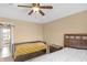 Bright bedroom featuring carpeted floors and lots of natural light from the window at 9877 Wading Crane Ave, Fishers, IN 46055