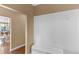 Light and bright entryway featuring beadboard walls and built-in storage, leading to the kitchen at 9877 Wading Crane Ave, Fishers, IN 46055