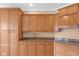 Well-appointed kitchen with granite countertops, custom cabinetry, and modern appliances at 9877 Wading Crane Ave, Fishers, IN 46055